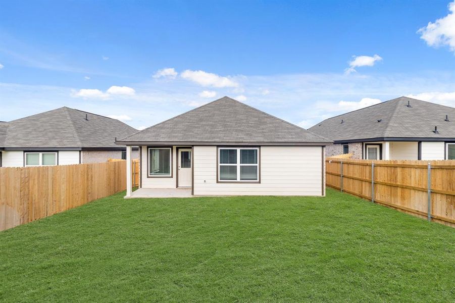 Exterior details and patio area of a home in Christian Meadows, Ennis (Image 2). Exterior details and patio area of a home in Christian Meadows, Ennis (Image 2).