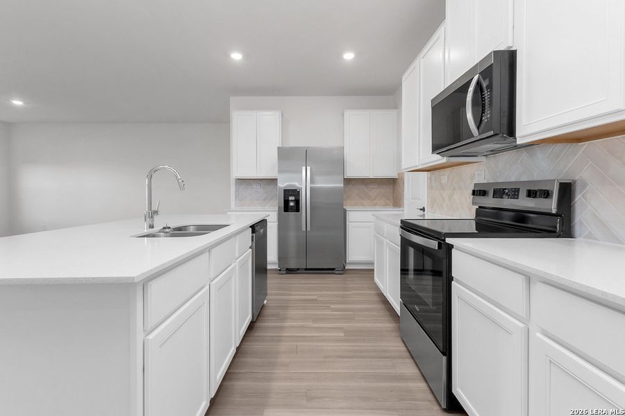 Furnished interior view inside a new home in Preserve at Culebra - Heritage Collection, San Antonio (Image 6).