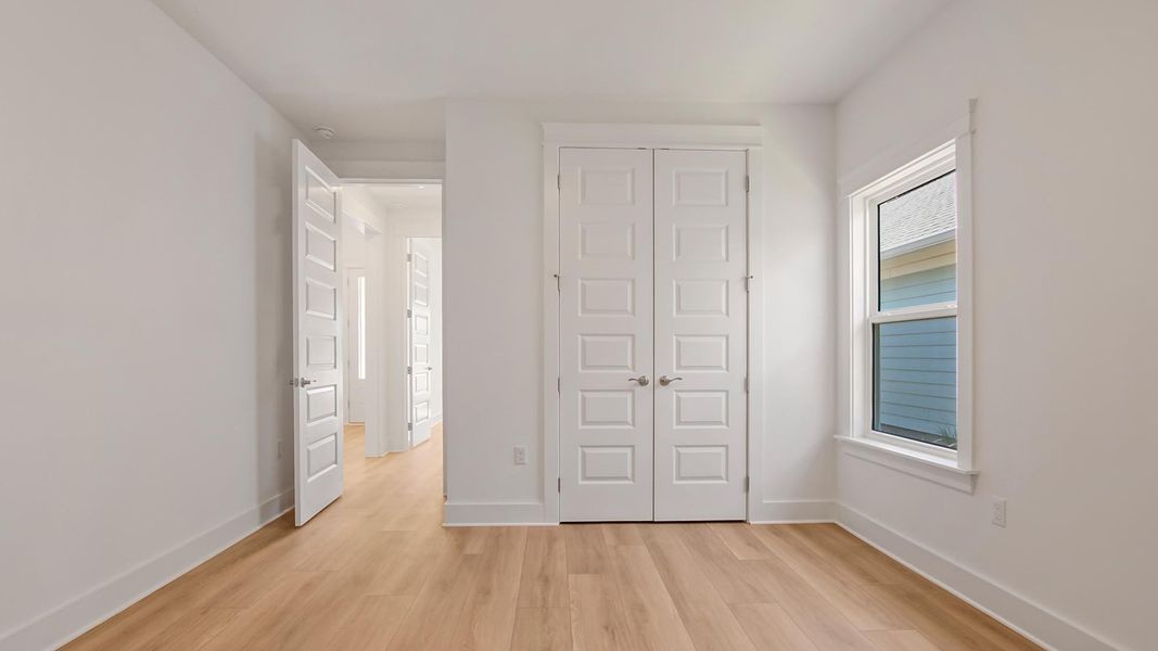 Spacious, unfurnished interior of a new home in Breakfast Point East Phase II, Panama City Beach (Image 28).