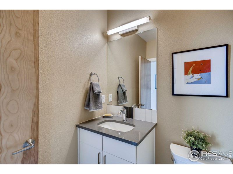 Powder Bathroom. Photos are of the model home.