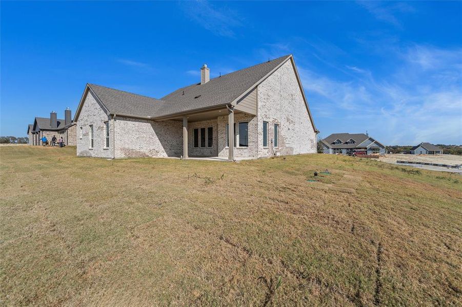Exterior details and patio area of a home in Creekview Addition, Van Alstyne (Image 29).