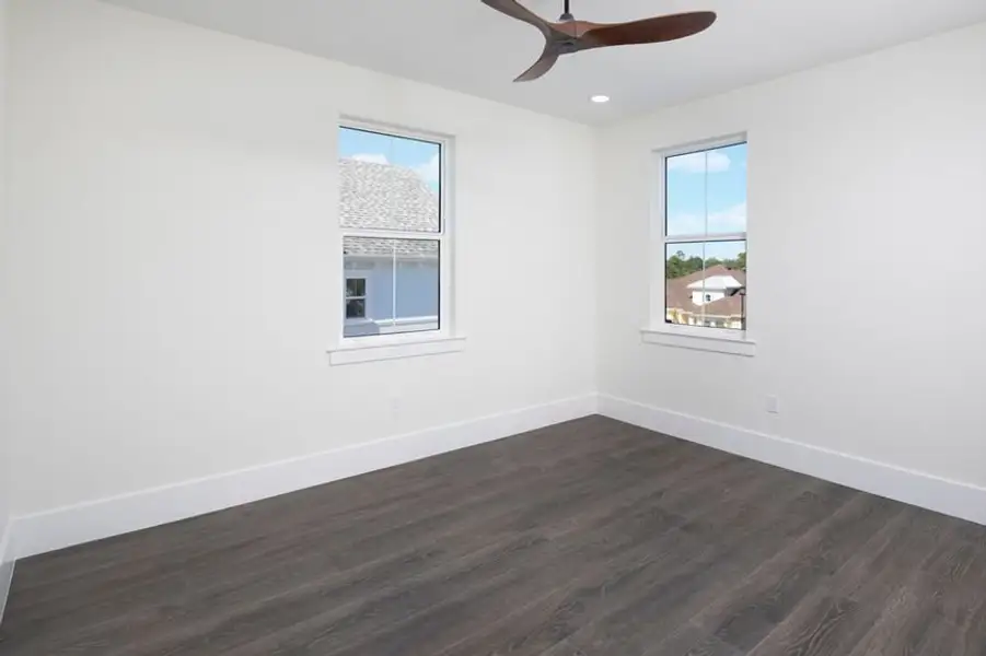 Representative unfurnished interior of a home built from the Grand Spinnaker by Minto Communities in Latitude Margaritaville Watersound, Panama City Beach (Image 13).