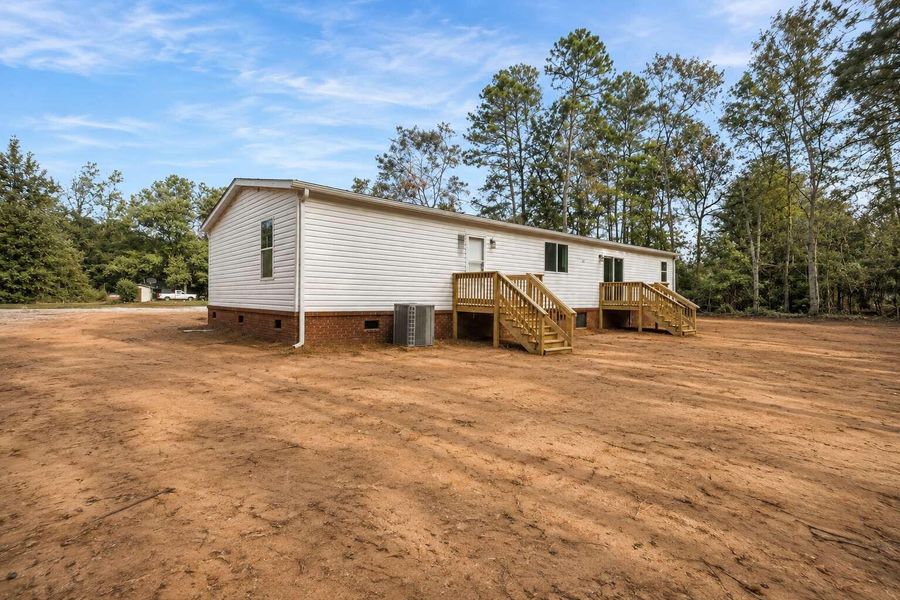 Exterior details and patio area of a home in , Holly Hill (Image 23).