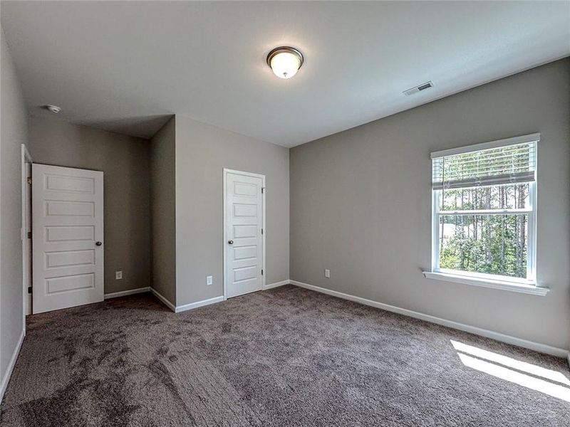 Spacious, unfurnished interior of a new home in Glen at Cave Springs, Douglasville (Image 22).