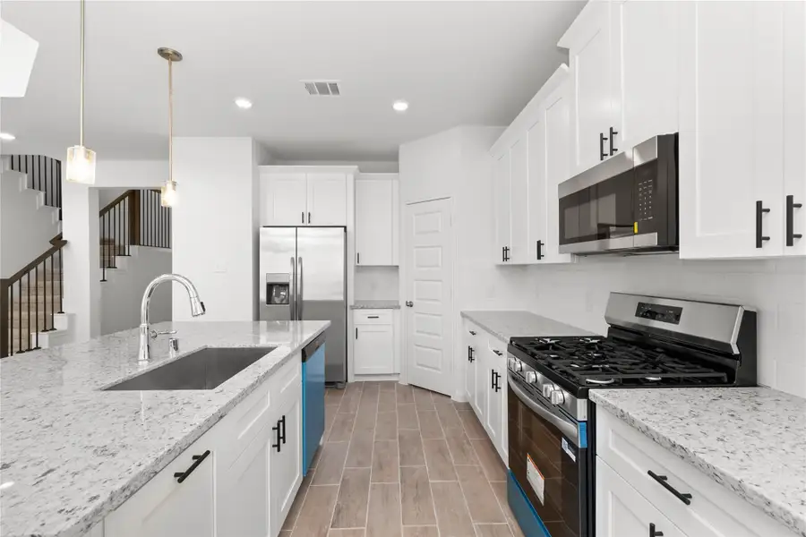 Furnished interior view inside a new home in Harmony Cove, Humble (Image 5).