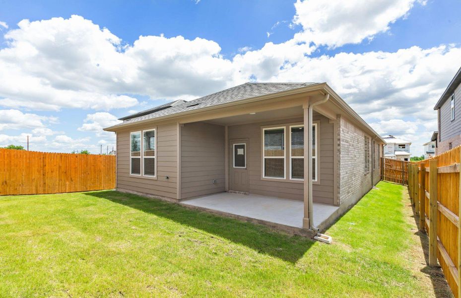 Front exterior of a new home in Crosswinds, Kyle, TX, highlighting curb appeal (Image 15). Front exterior of a new home in Crosswinds, Kyle, TX, highlighting curb appeal (Image 15).