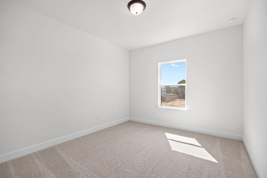 Spacious, unfurnished interior of a new home in Parmer Ranch - 60', Georgetown (Image 25). Spacious, unfurnished interior of a new home in Parmer Ranch - 60', Georgetown (Image 25).