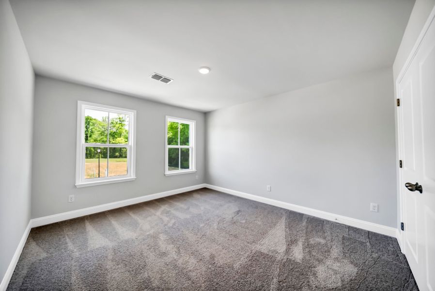 Spacious, unfurnished interior of a new home in Monroe Preserve, Chapin (Image 41).