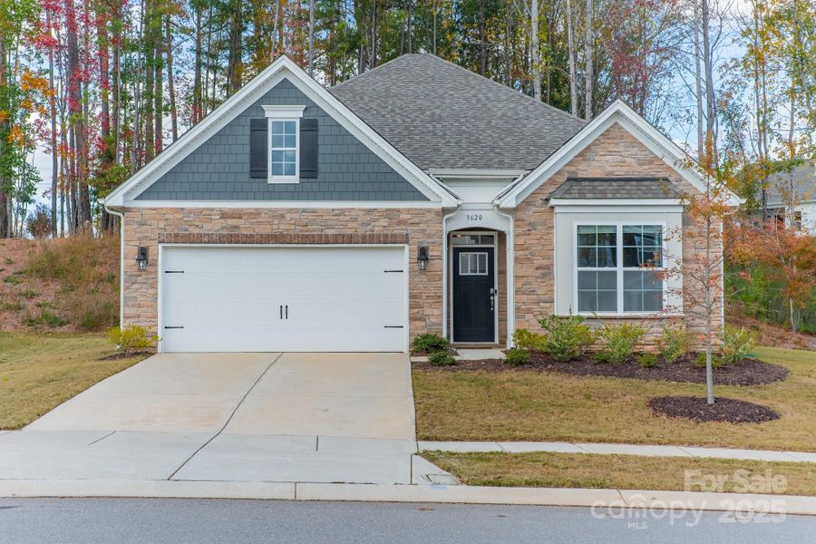 Front exterior of a new home in , Charlotte, NC, highlighting curb appeal (Image 21). Front exterior of a new home in , Charlotte, NC, highlighting curb appeal (Image 21).