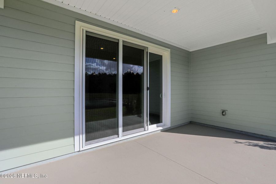 Exterior details and patio area of a home in Amberly, Green Cove Springs (Image 24).