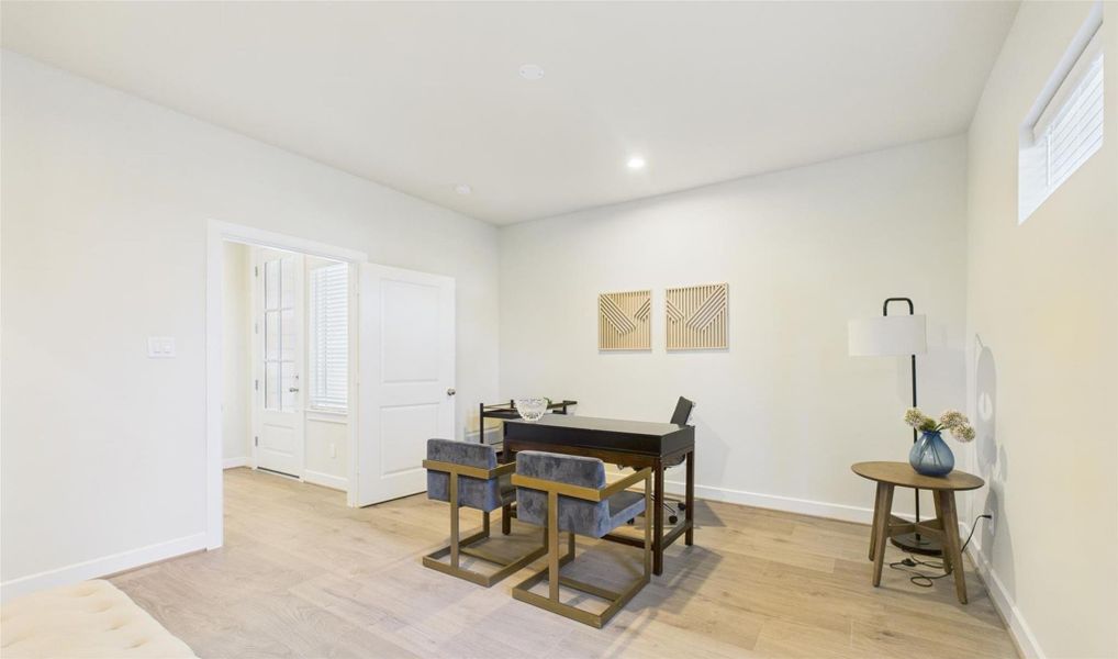 One of the secondary bedrooms used as an office