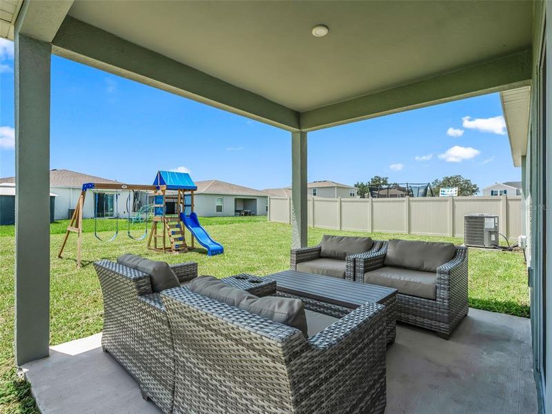 Exterior details and patio area of a home in , Sumterville (Image 24).