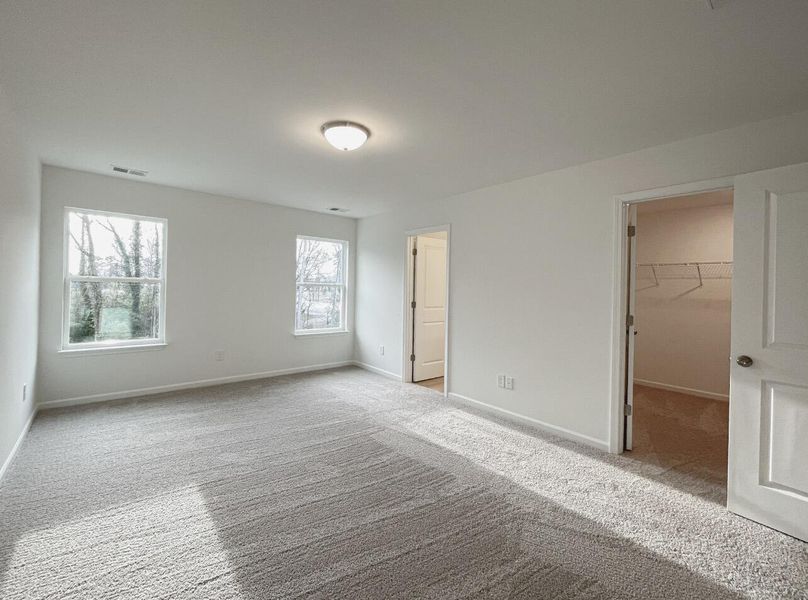 Spacious, unfurnished interior of a new home in East Main Townes, Spartanburg (Image 19).
