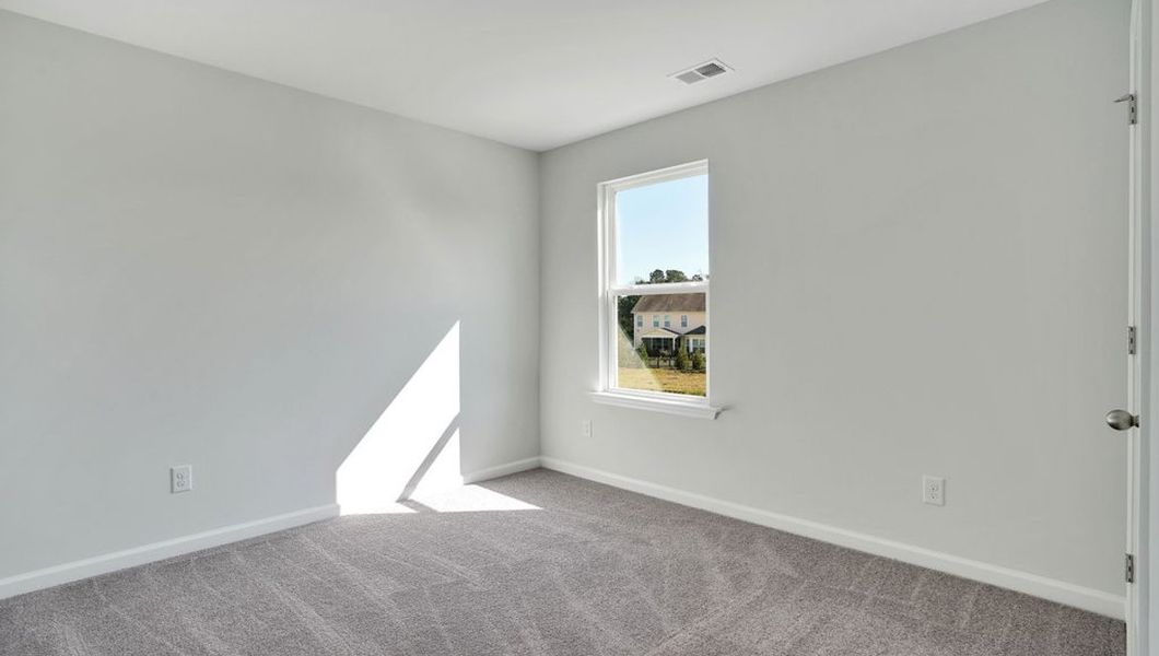 Representative unfurnished interior of a home built from the ROBIE by D.R. Horton in The Pines at Blake Farm, Wilmington (Image 21).