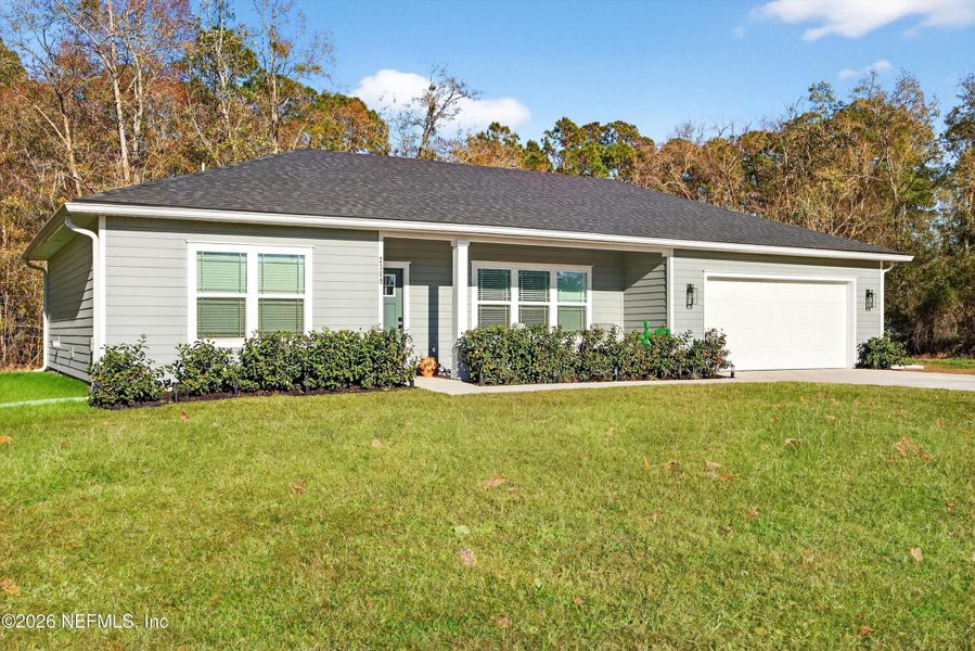 Exterior details and patio area of a home in , Middleburg (Image 25).