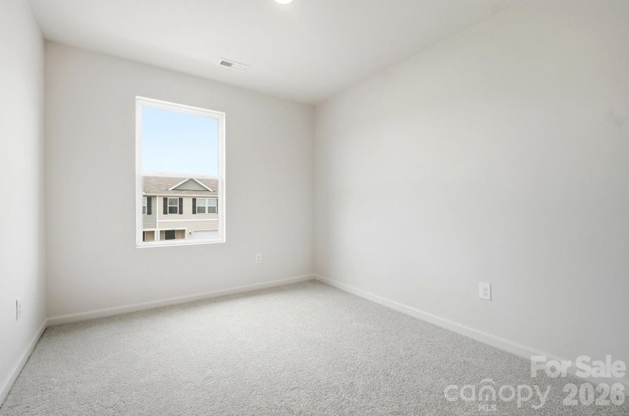 Spacious, unfurnished interior of a new home in Trivium, Newton (Image 27).