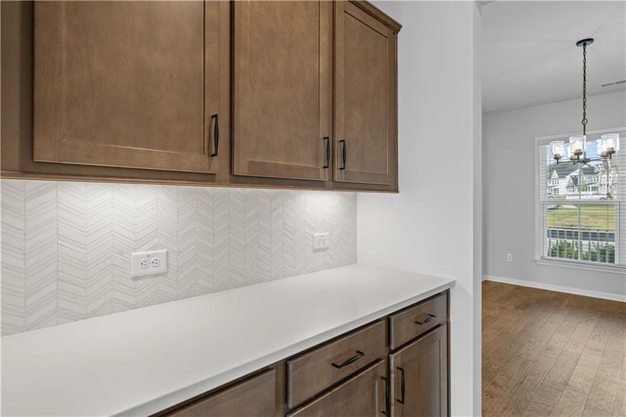 Furnished interior view inside a new home in Reunion, Flowery Branch (Image 11). Furnished interior view inside a new home in Reunion, Flowery Branch (Image 11).