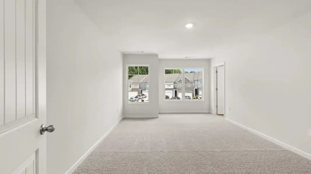 Spacious, unfurnished interior of a new home in Waypoint, Flowery Branch (Image 13).