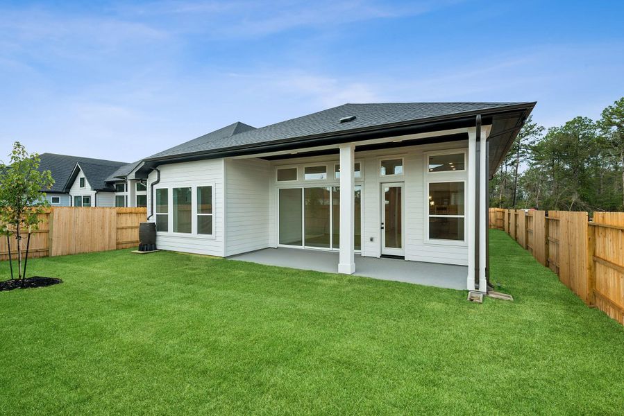Exterior details and patio area of a home in ARTAVIA 50' Homesites, Conroe (Image 3).