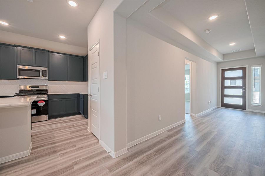 Spacious, unfurnished interior of a new home in Sunterra, Katy (Image 11). Spacious, unfurnished interior of a new home in Sunterra, Katy (Image 11).