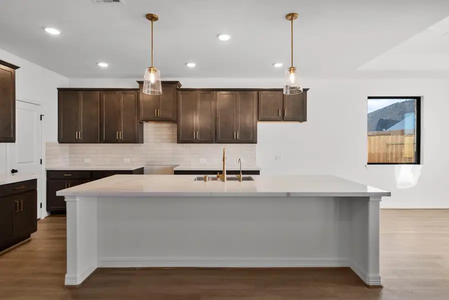 Kitchen. Sample product photo. Actual exterior and interior selections may vary by homesite. Photo may be virtually staged. Kitchen. Sample product photo. Actual exterior and interior selections may vary by homesite. Photo may be virtually staged.