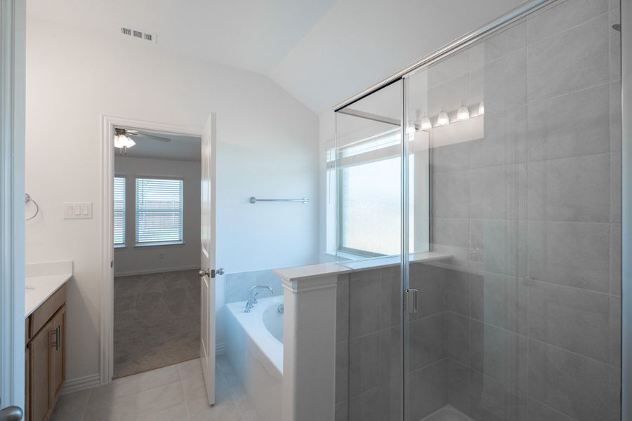 Furnished interior view inside a new home in Lake Pointe, Little Elm (Image 8).
