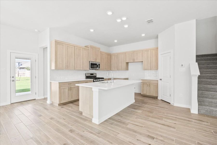 Furnished interior view inside a new home in Trace, San Marcos (Image 9).