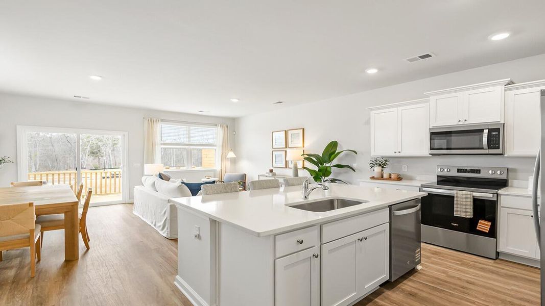 Furnished interior view inside a new home in The Crossing at St. James, Goose Creek (Image 7).