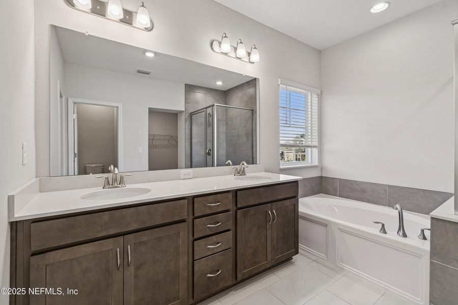 Furnished interior view inside a new home in Tributary 70', Yulee (Image 13).