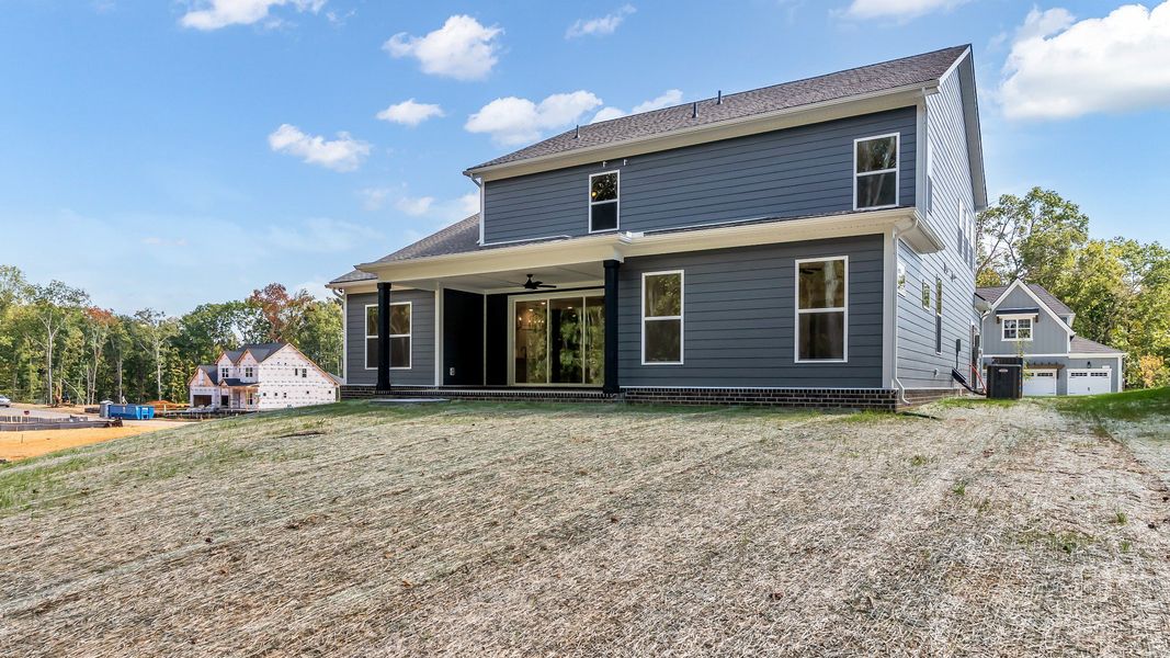 Exterior details and patio area of a home in Brush Creek, Fairview (Image 27).
