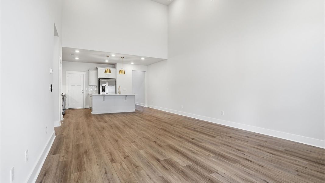 Notable two-story family room offering a grand yet inviting space for memorable everyday living near Lake Hartwell Notable two-story family room offering a grand yet inviting space for memorable everyday living near Lake Hartwell