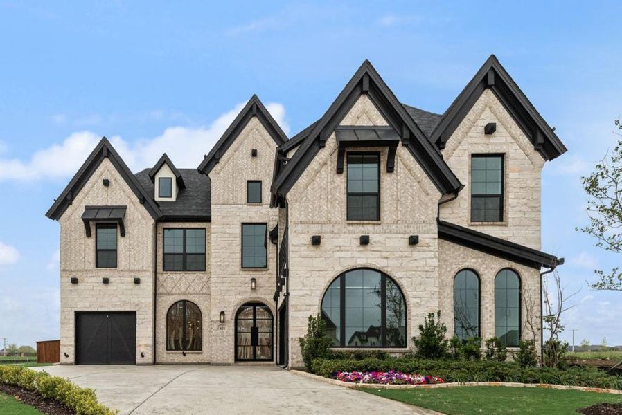 Front exterior of a new home in Park Place, Prosper, TX, highlighting curb appeal (Image 1). Front exterior of a new home in Park Place, Prosper, TX, highlighting curb appeal (Image 1).