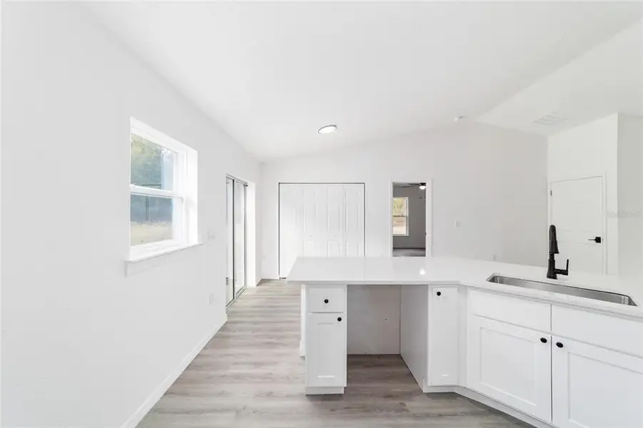 Furnished interior view inside a new home in , Dunnellon (Image 16).