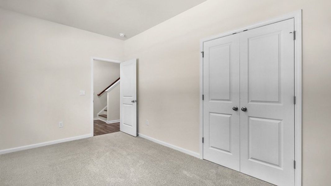 Spacious, unfurnished interior of a new home in The Townes at Madden West, Fuquay Varina (Image 17).