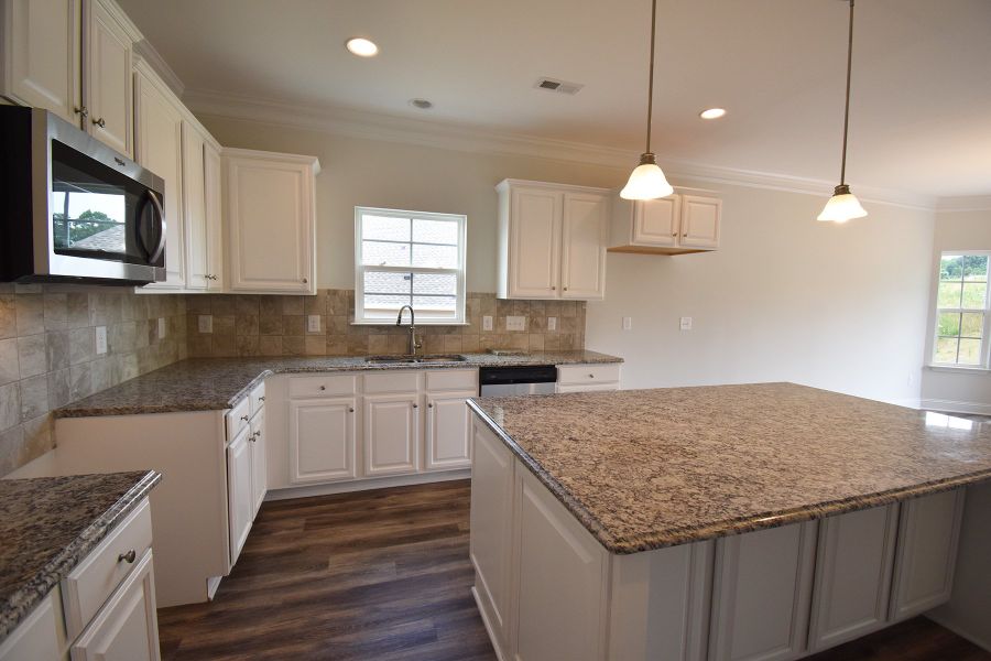 Representative furnished interior of a home built from the Ellerbe by Keystone Homes NC in Sullivans Reserve, Walkertown (Image 8).