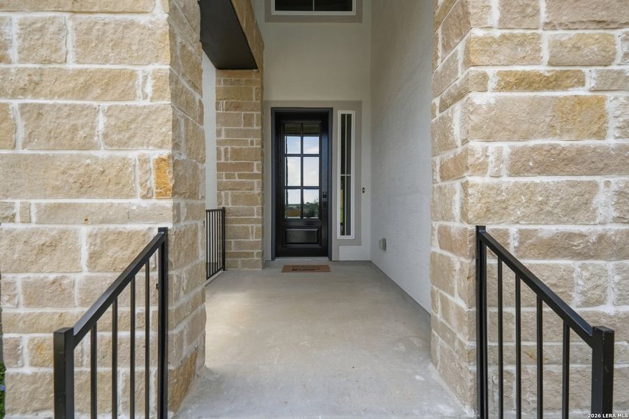 Exterior details and patio area of a home in The Reserve at Potranco Oaks, Castroville (Image 29).
