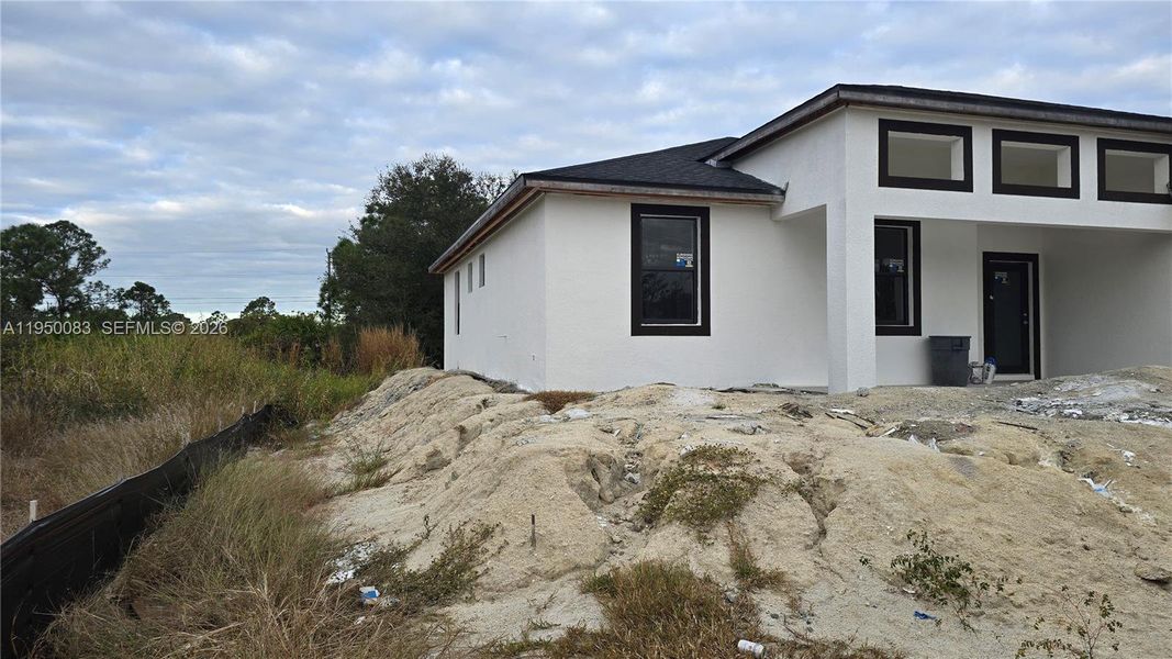 In-progress construction of a new home in , Lehigh Acres, FL (Image 11).