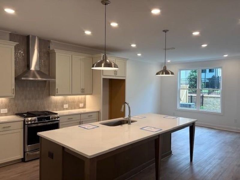 kitchen, open concept living, stainless steel appliances include - microwave, dishwasher, stove and hood kitchen, open concept living, stainless steel appliances include - microwave, dishwasher, stove and hood
