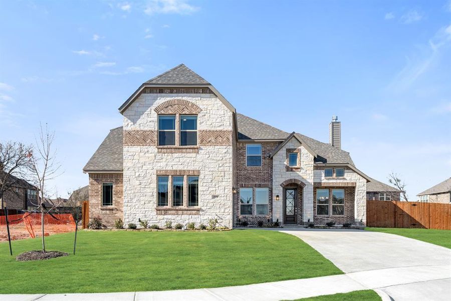 Front exterior of a new home in Sunrise at Garden Valley, Waxahachie, TX, highlighting curb appeal (Image 2).