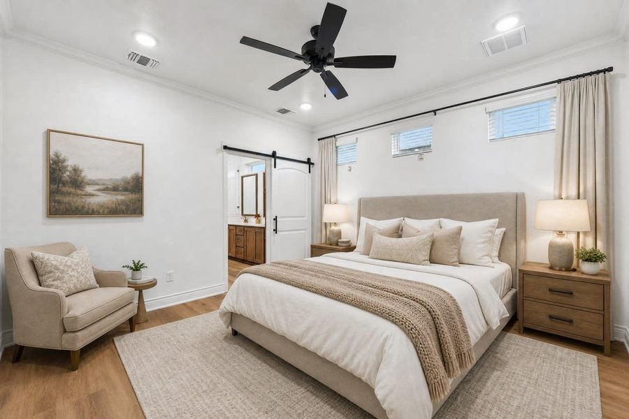 A well-appointed bedroom provides a serene retreat, complete with wood-look flooring and a modern ceiling fan. Virtually staged. A well-appointed bedroom provides a serene retreat, complete with wood-look flooring and a modern ceiling fan. Virtually staged.