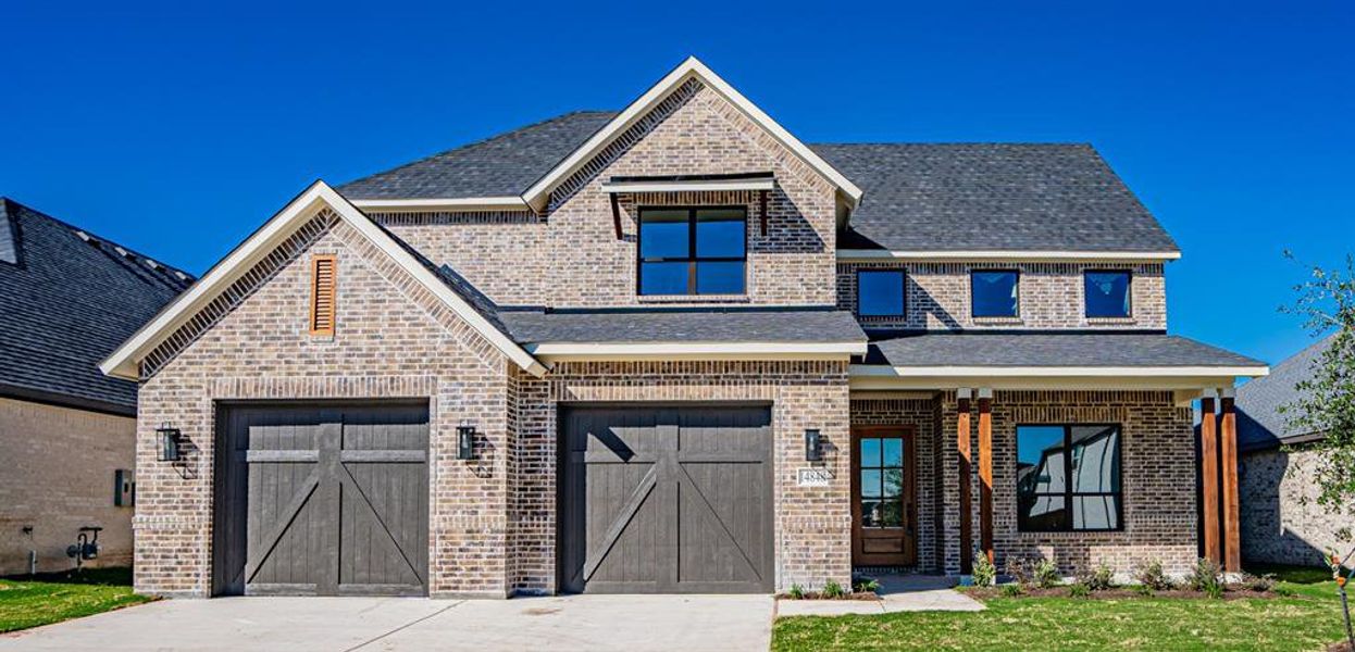 Front exterior of a new home in , Aledo, TX, highlighting curb appeal (Image 20).