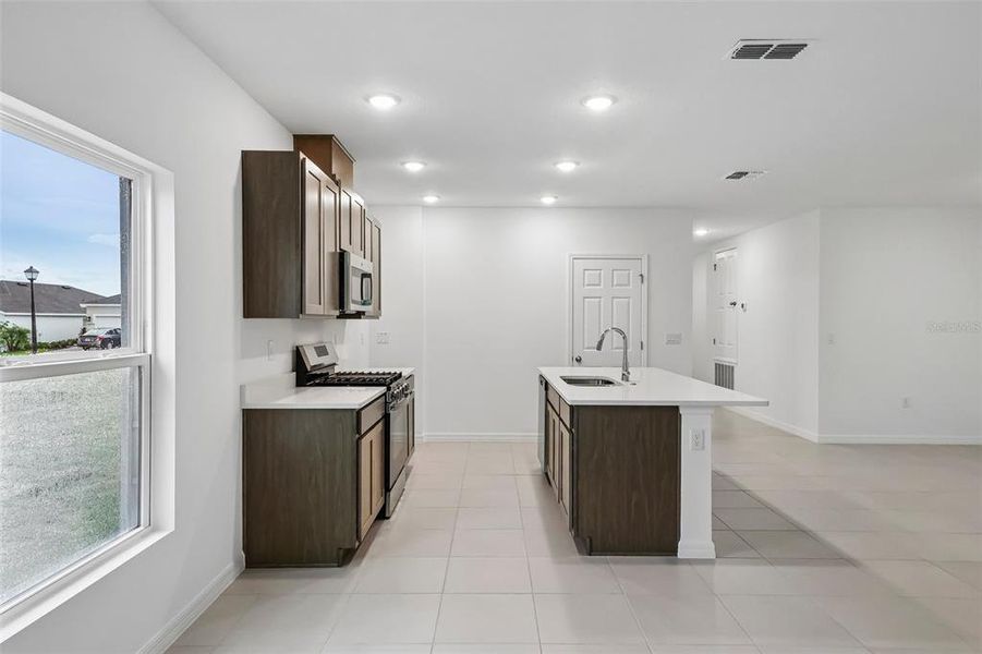 Furnished interior view inside a new home in Eagletail Landings, Howey-in-the-Hills (Image 8).