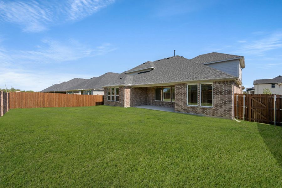 Exterior details and patio area of a home in Inspiration Collection at View at the Reserve, Mansfield (Image 15).