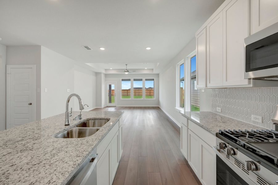 Furnished interior view inside a new home in Mason Woods, Cypress (Image 7).