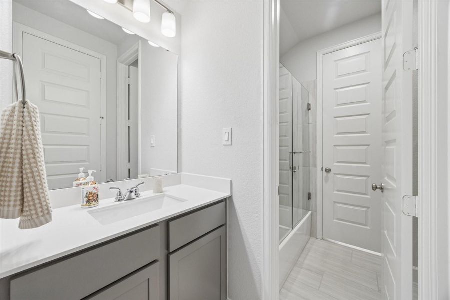 Furnished interior view inside a new home in Sienna, Missouri City (Image 27).