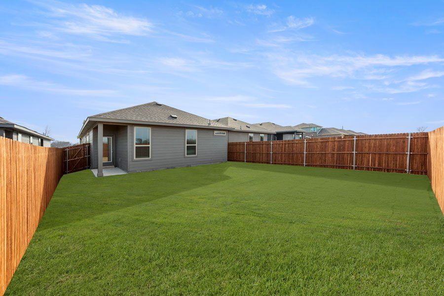 Representative exterior photo of a completed home built from the Mesquite by Impression Homes in Creekside Ranch, Blue Ridge, TX (Image 24). Representative exterior photo of a completed home built from the Mesquite by Impression Homes in Creekside Ranch, Blue Ridge, TX (Image 24).