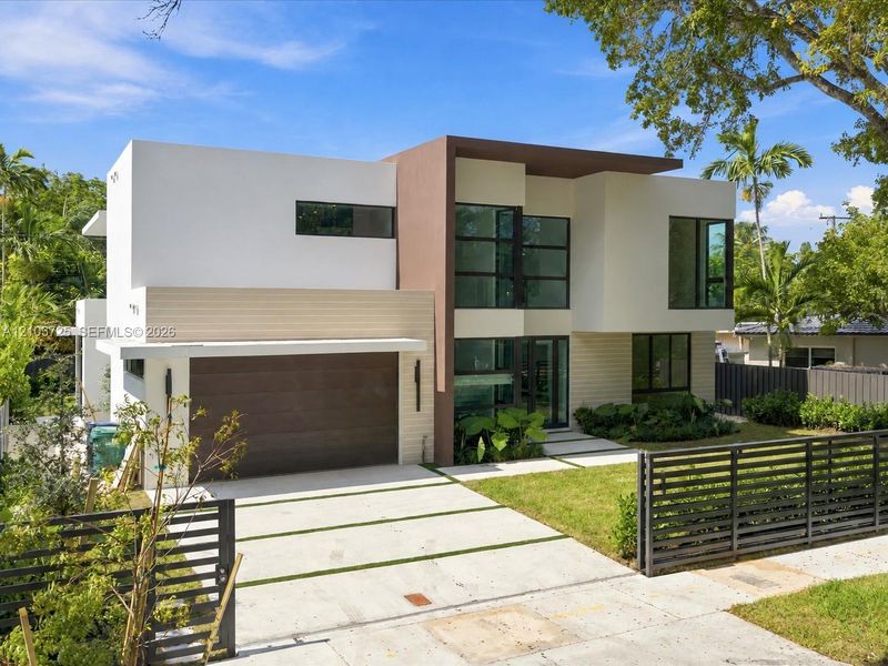 Front exterior of a new home in , Miami, FL, highlighting curb appeal (Image 26).