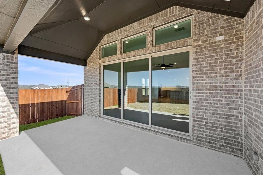 Exterior details and patio area of a home in High Country, Burleson (Image 26).