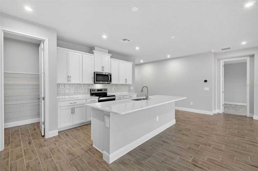 Furnished interior view inside a new home in Windwater, Parrish (Image 8).