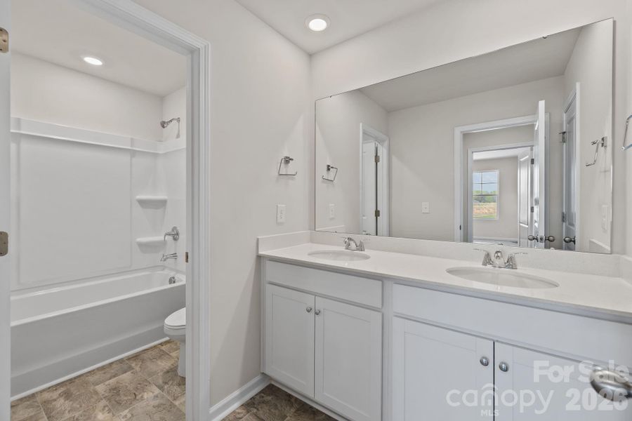 Furnished interior view inside a new home in McFarland Estates, York (Image 15).